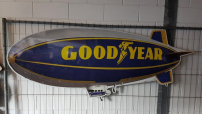 Large advertising sign for Goodyear tires 🏁🏁