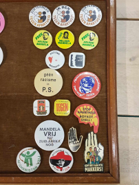 18 vintage buttons against racism, fascism, etc..