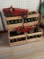 Old wooden crate, bottle crate with 12 wine bottles.