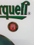 Beer advertisement Pilsner Urquell on a facet cut glass plate.