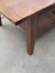 Heavy, solid, rustic, colonial coffee table made of teak